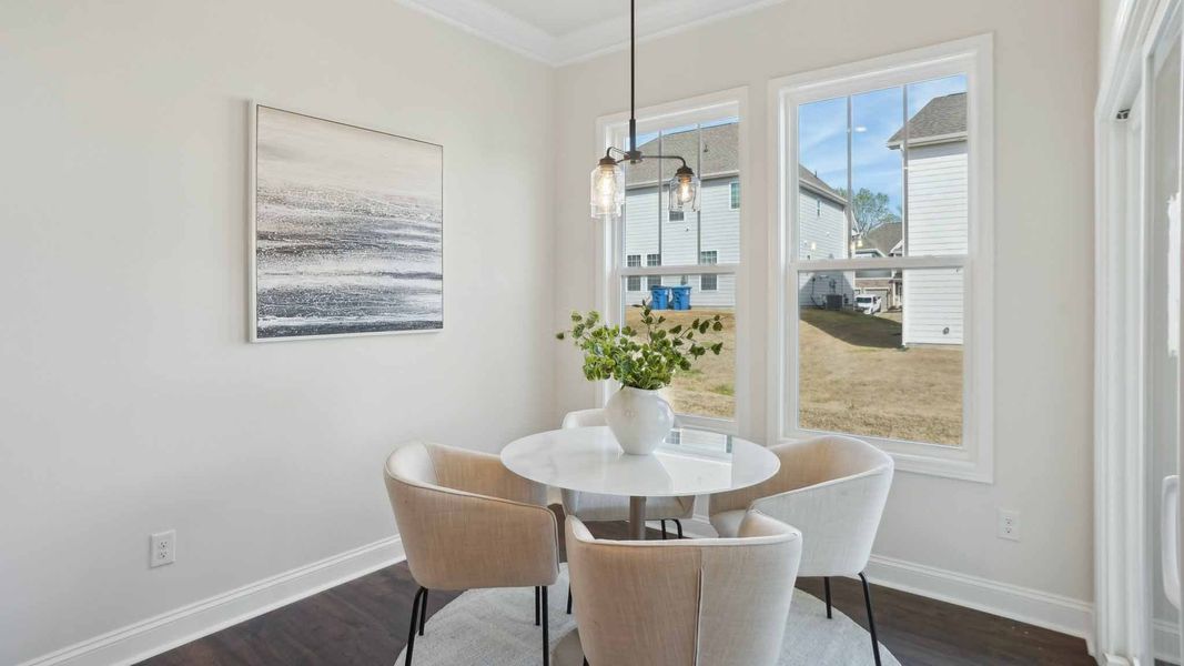 Furnished interior in a model home at Reserve at Tap Root Farms in Fletcher (Image 11).