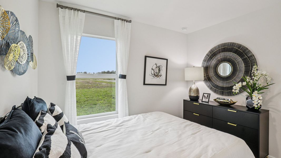 Furnished interior in a model home at Seagrass in Punta Gorda (Image 29).