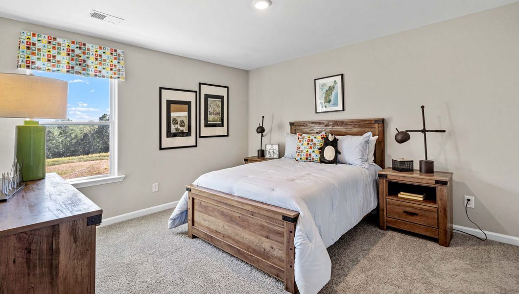 Furnished interior in a model home at Chestnut Ridge in Greenville (Image 17).