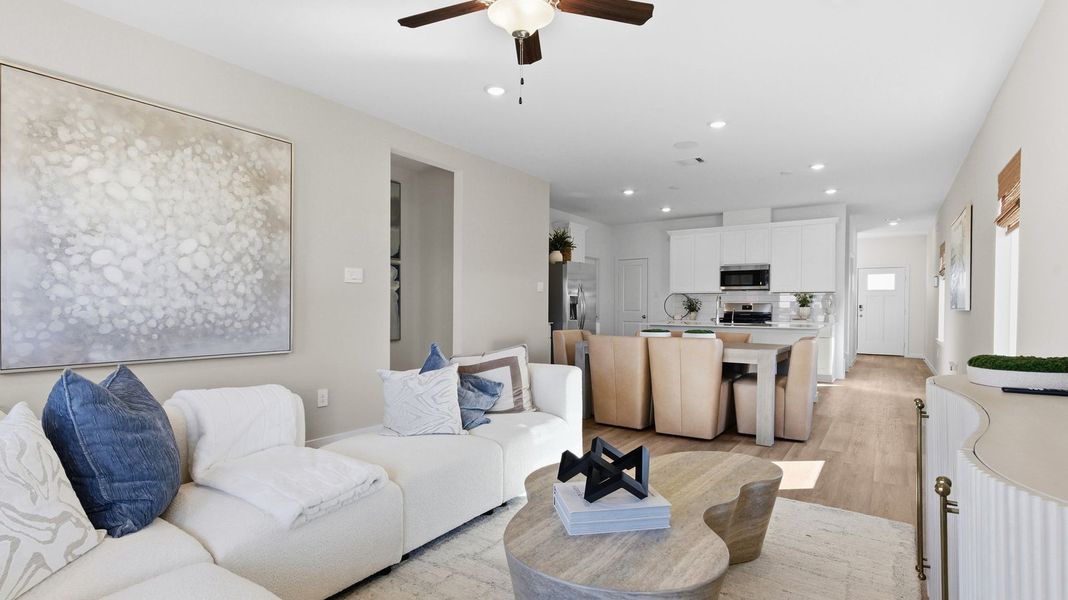 Furnished interior in a model home at Caldwell Crossing in Iowa Colony (Image 4).