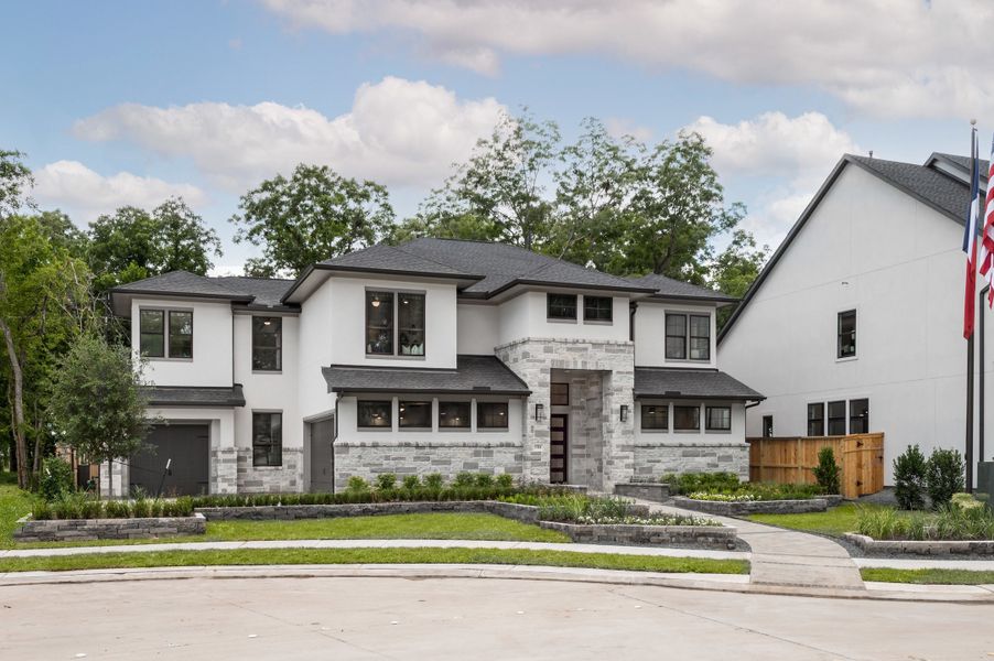 Front exterior of a home in the Sienna 80′ community, located in Missouri City, TX (Image 3).
