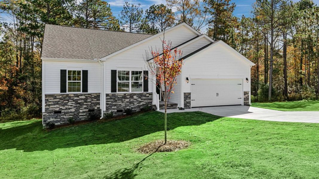 Front exterior of a home in the Gretchen Pines community, located in West End, NC (Image 20). Front exterior of a home in the Gretchen Pines community, located in West End, NC (Image 20).