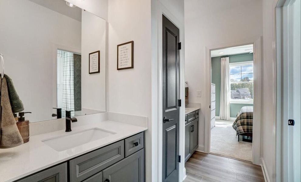 Furnished interior in a model home at Peyton's Creek in Statesville (Image 15).