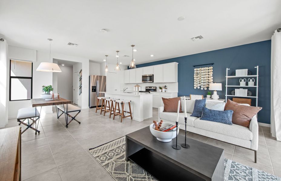 Bright and open gathering room at Sawgrass at Coral Lakes offering move in ready homes in Cape Coral