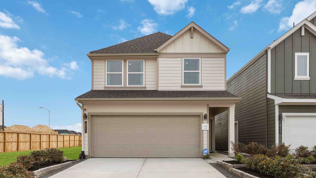 Front exterior of a home in the Grand West community, located in Houston, TX (Image 3).
