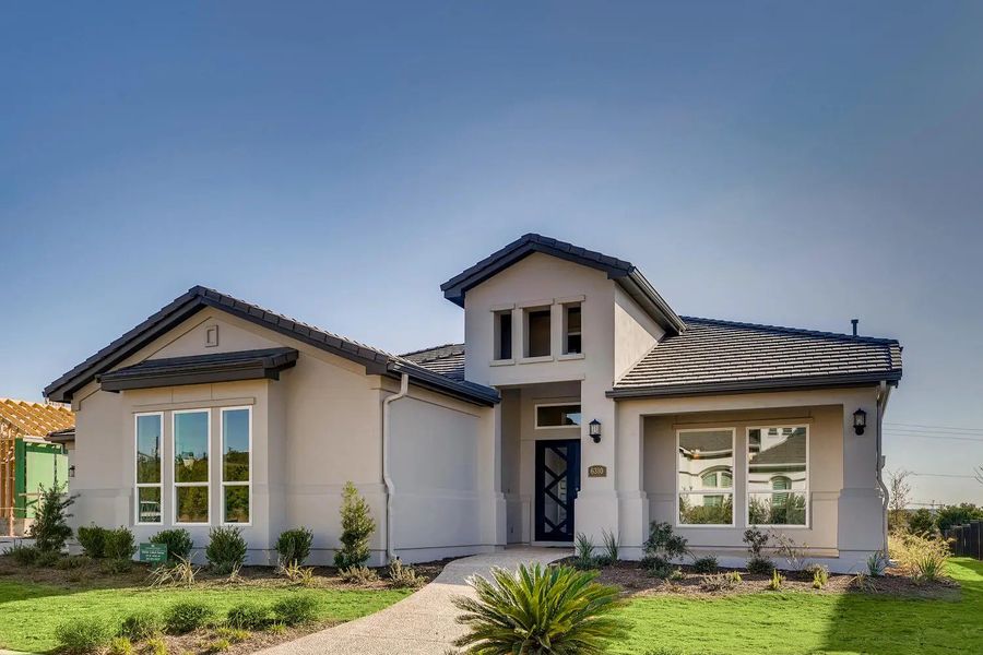 Front exterior of a home in the Andalucia At The Dominion community, located in Shavano Park, TX (Image 5).