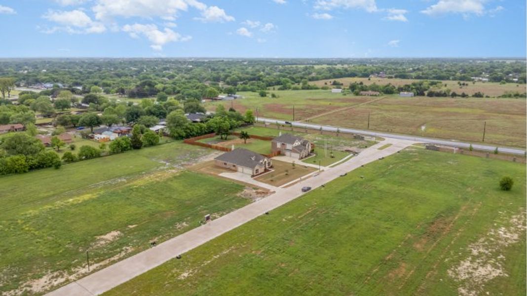 Aerial view of the Crystal Lake Estates community in Red Oak, TX, showing layout and nearby surroundings (Image 1). Aerial view of the Crystal Lake Estates community in Red Oak, TX, showing layout and nearby surroundings (Image 1).