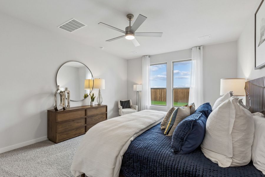 Primary Suite in a Madero New Winters Model in Haslet TX by Trophy Signature Homes