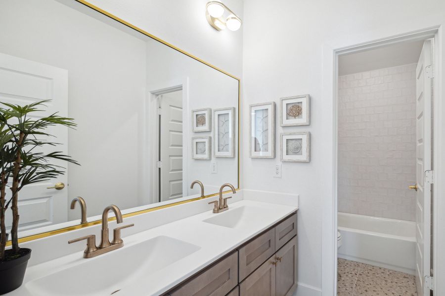 Furnished interior in a model home at The Groves - 45' in Humble (Image 11).