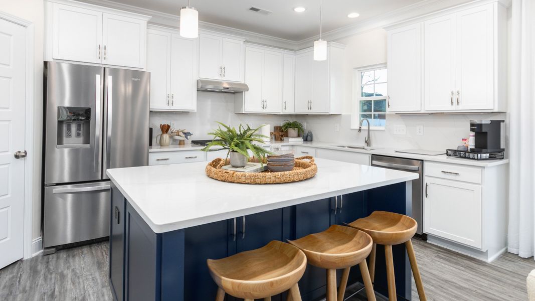 Furnished interior in a model home at Royal Pines in Trinity (Image 5).