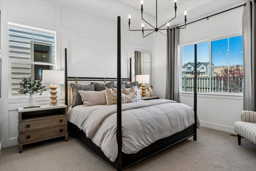 A bedroom with a large bed.