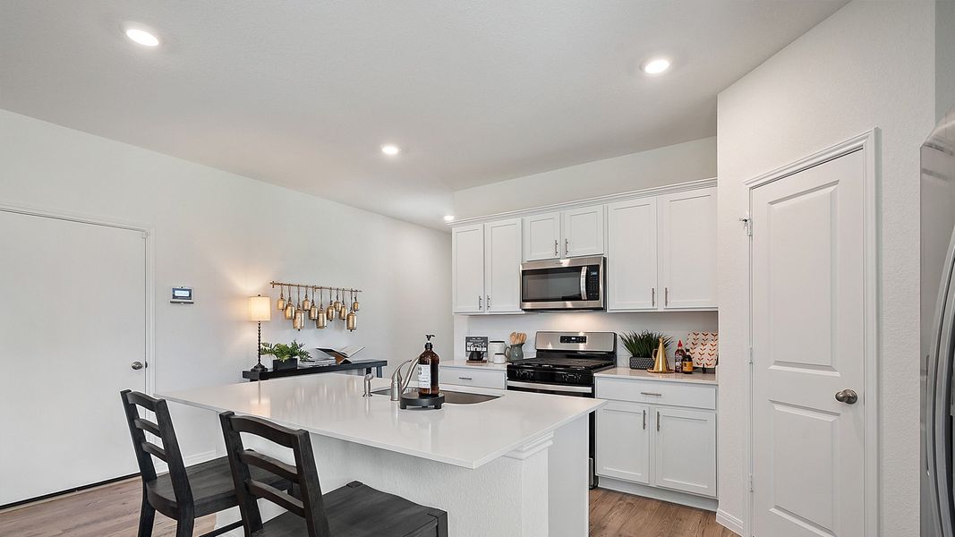 Furnished interior in a model home at Rosenbusch Ranch in Leander (Image 60).