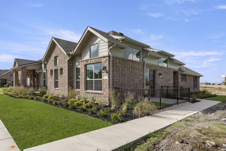 Front exterior of a home in the Woodbridge Villas community, located in Wylie, TX (Image 17).