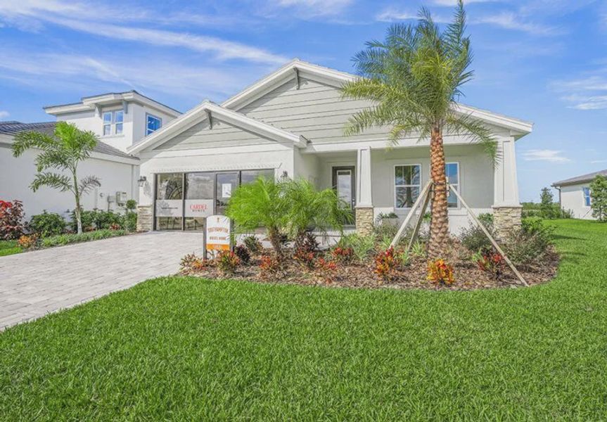 Front exterior of a home in the Coasterra community, located in Palmetto, FL (Image 3).