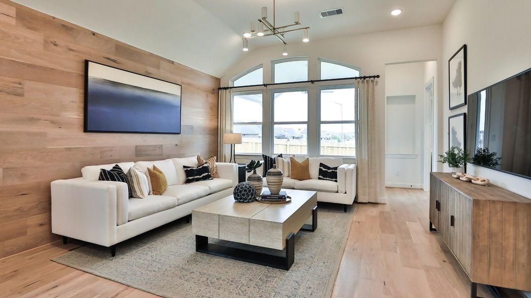 Furnished interior in a model home at Wildrye in Waller (Image 4).