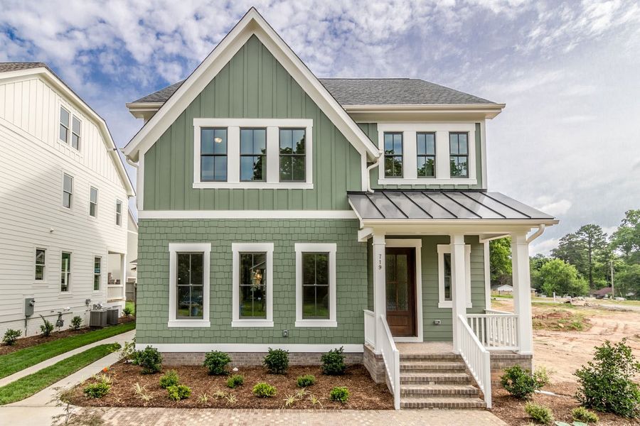 Front exterior of a home in the Oakdale at Mordecai - Raleigh - Robuck Homes community, located in Garner, NC (Image 10). Front exterior of a home in the Oakdale at Mordecai - Raleigh - Robuck Homes community, located in Garner, NC (Image 10).
