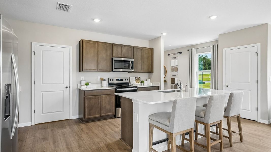 Furnished interior in a model home at Waterstone in Tampa (Image 22).