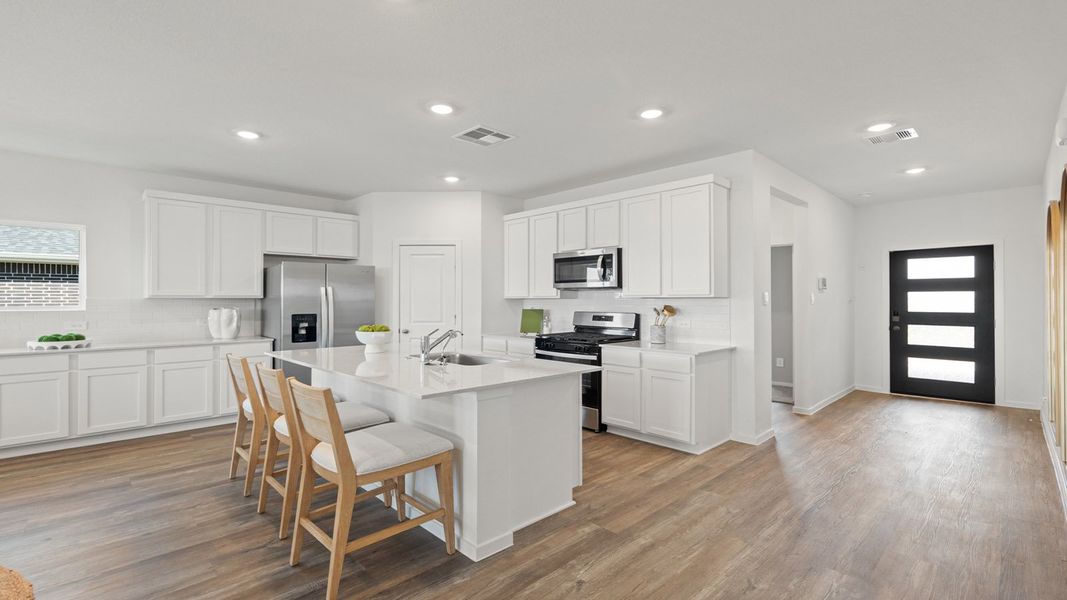 Furnished interior in a model home at Sunterra Lakes in Brookshire (Image 7).