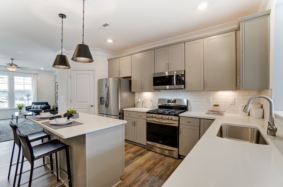 Furnished interior in a model home at Bellevue Townhomes in Greenville (Image 4). Furnished interior in a model home at Bellevue Townhomes in Greenville (Image 4).