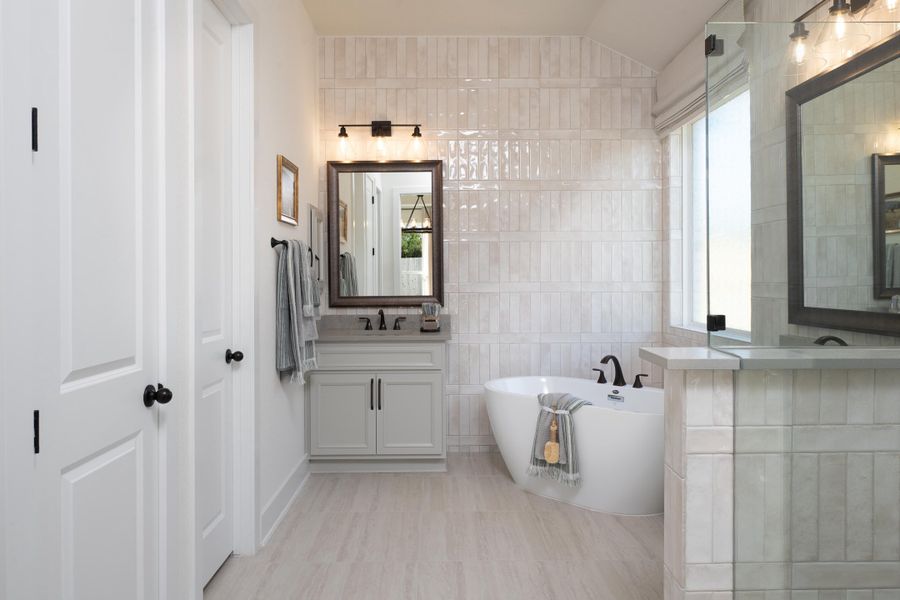 Furnished interior in a model home at Sunday Creek at Kinder Ranch in San Antonio (Image 11).