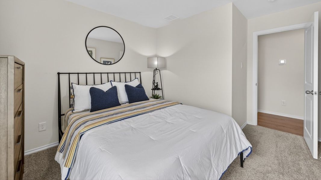 Furnished interior in a model home at The Hills of Sherman in Sherman (Image 34).