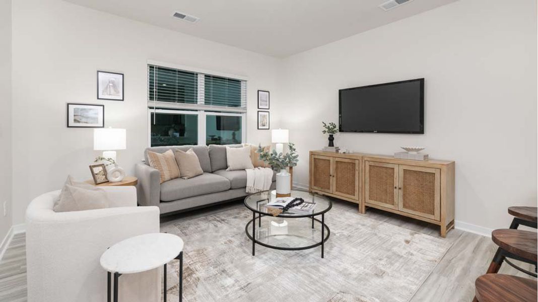 Furnished interior in a model home at The Townes at Troutman in Troutman (Image 6).