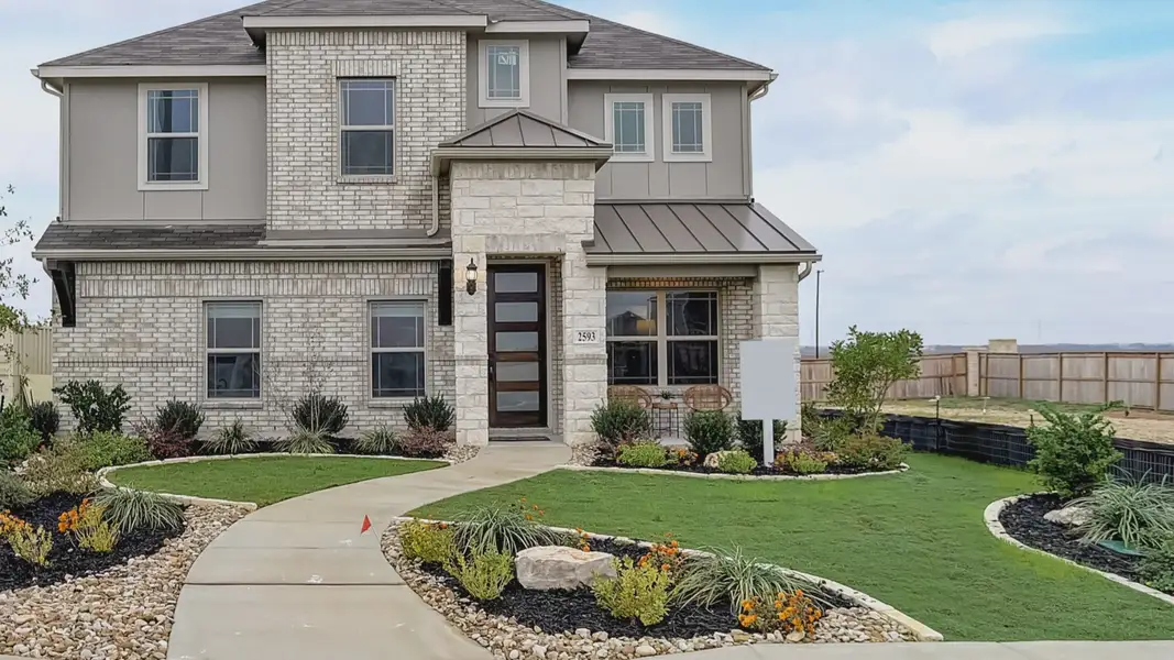Front exterior of a home in the Dauer Ranch community, located in New Braunfels, TX (Image 4). Front exterior of a home in the Dauer Ranch community, located in New Braunfels, TX (Image 4).