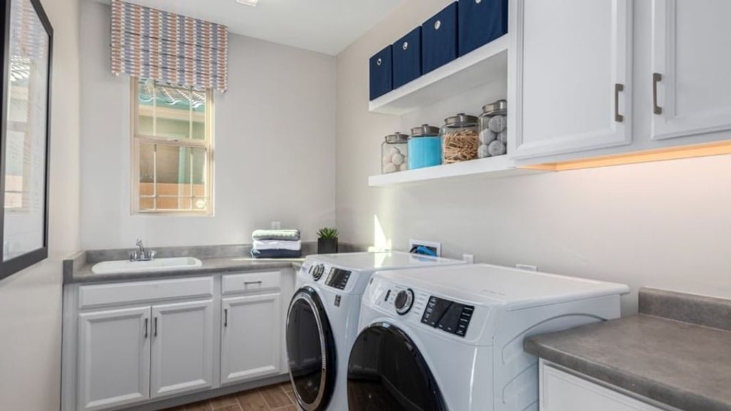 Furnished interior in a model home at Alamar Encore Collection in Avondale (Image 45).