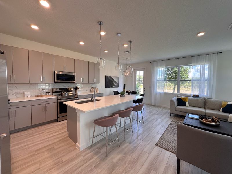 Furnished interior in a model home at The Enclaves at Festival Cove in Davenport (Image 26).