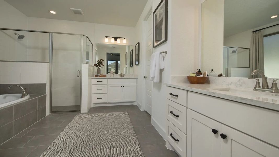 Furnished interior in a model home at Lakes Of Cane Island 45' in Katy (Image 27).