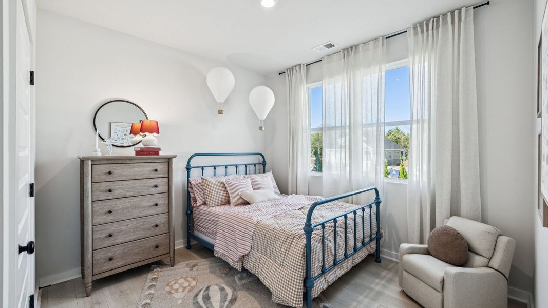 Furnished interior in a model home at Harvest Point in Spring Hill (Image 52).