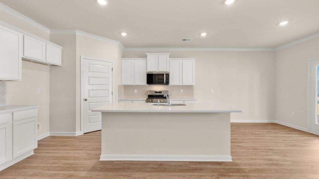 Furnished interior in a model home at Independence in Loganville (Image 8).