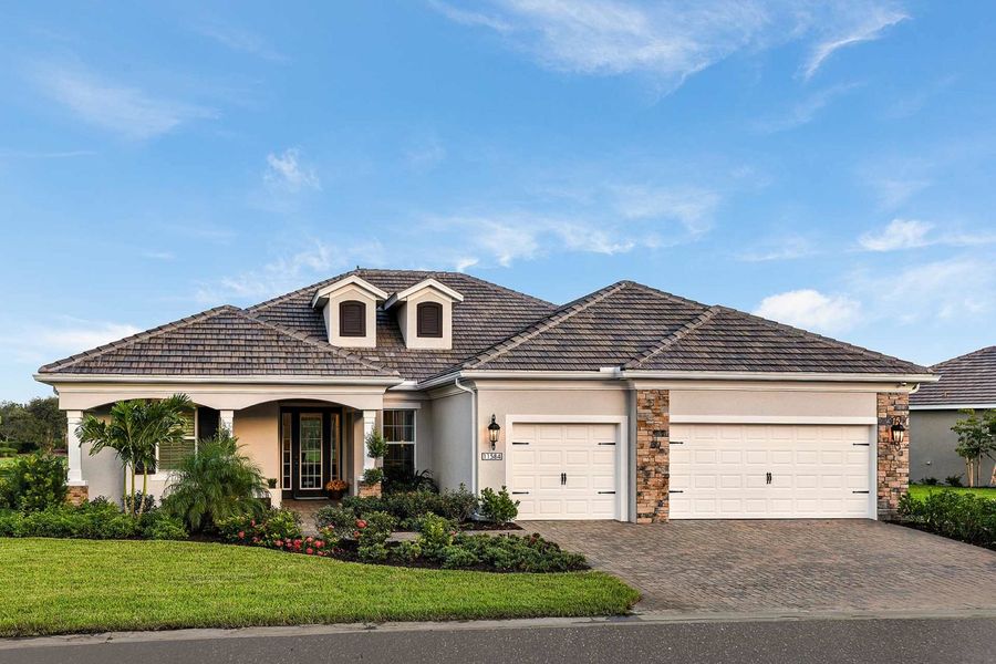 Front exterior of a home in the Verandah community, located in Fort Myers, FL (Image 3).