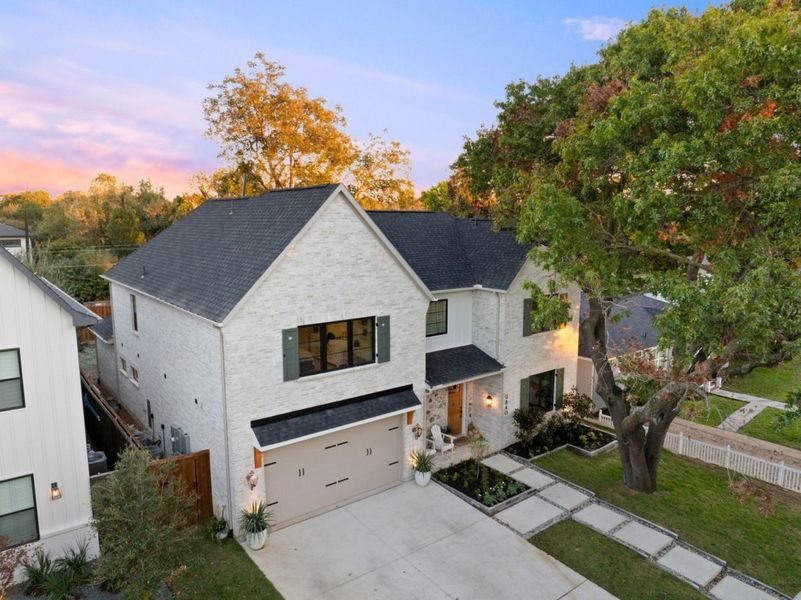 Front exterior of a home in the Bluff Hollow community, located in Plano, TX (Image 1).