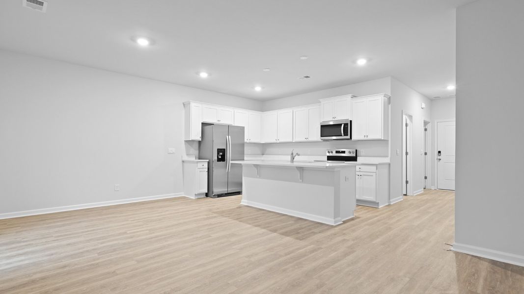 Furnished interior in a model home at Garbon Fields in Summerville (Image 4).