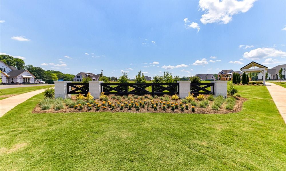 Entrance to the Stephens Farm community in Huntersville, NC, featuring signage and landscaping (Image 9). Entrance to the Stephens Farm community in Huntersville, NC, featuring signage and landscaping (Image 9).