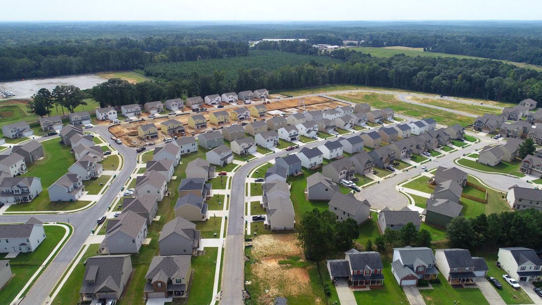 A large area with many buildings and trees around it. A large area with many buildings and trees around it.