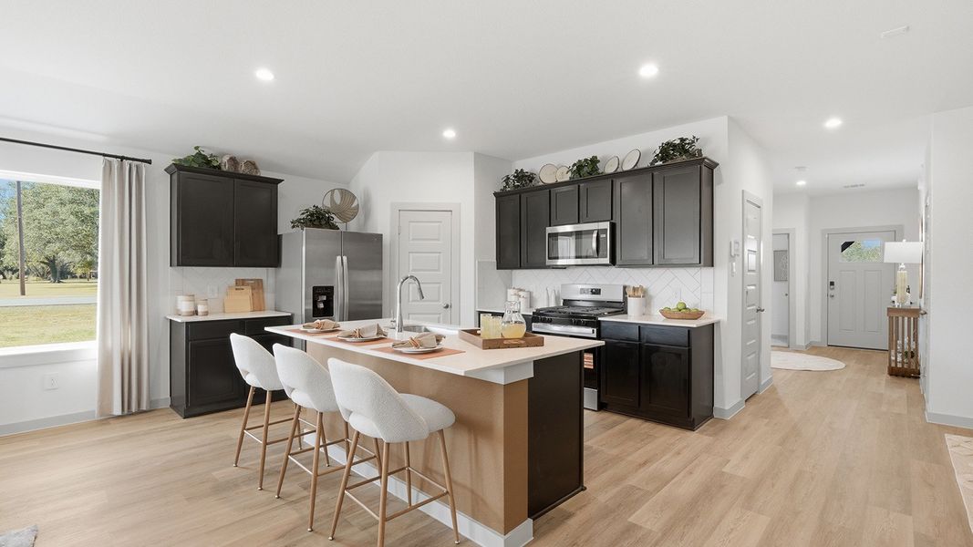 Furnished interior in a model home at Highland Village in Nome (Image 4).