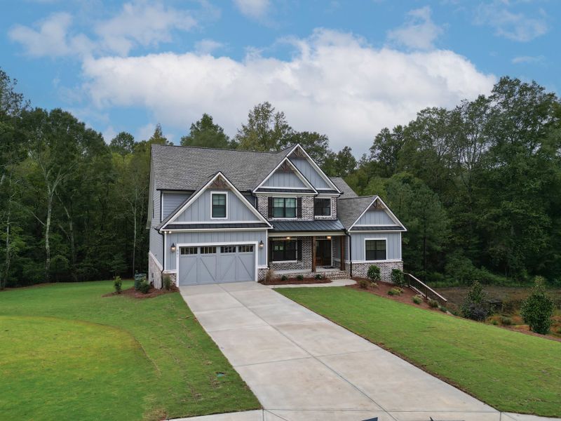 Front exterior of a home in the Spring Creek community, located in Monroe, GA (Image 10). Front exterior of a home in the Spring Creek community, located in Monroe, GA (Image 10).