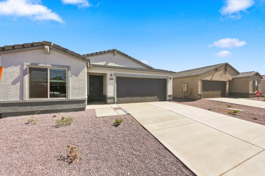 Front exterior of a home in the Cross Creek Ranch community, located in Coolidge, AZ (Image 3). Front exterior of a home in the Cross Creek Ranch community, located in Coolidge, AZ (Image 3).
