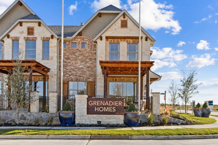 Entrance to the The Tribute community in The Colony, TX, featuring signage and landscaping (Image 1). Entrance to the The Tribute community in The Colony, TX, featuring signage and landscaping (Image 1).