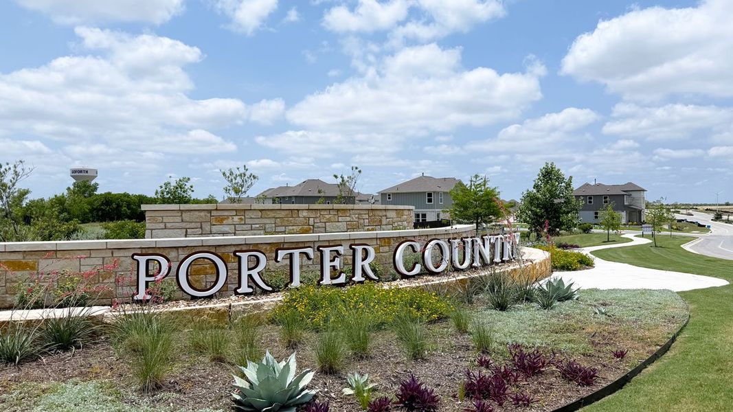 Entrance to the Porter Country community in Buda, TX, featuring signage and landscaping (Image 2).