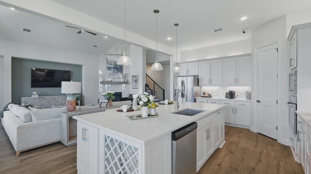 Exquisite white marble island and custom cabinetry in Rio Vista, Kelly Ranch. Timeless elegance and modern functionality. Exquisite white marble island and custom cabinetry in Rio Vista, Kelly Ranch. Timeless elegance and modern functionality.
