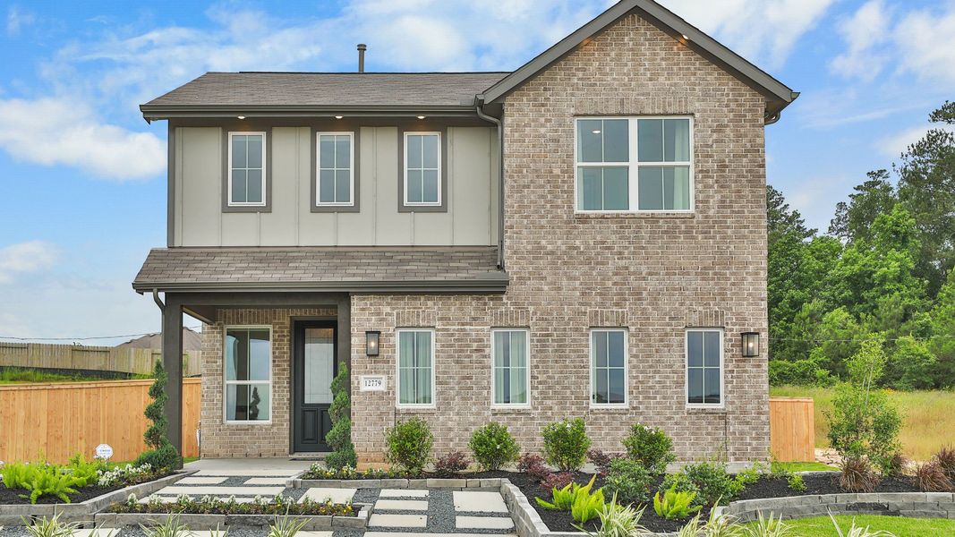 Elegant brick facade with sleek lines and expansive windows. Mostyn Springs offers landscaped serenity. Elegant brick facade with sleek lines and expansive windows. Mostyn Springs offers landscaped serenity.