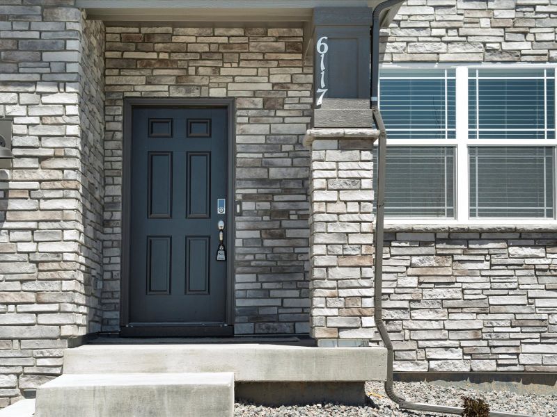 Entry in the Wateron floorplan at a Meritage Homes community in Brighton, CO.