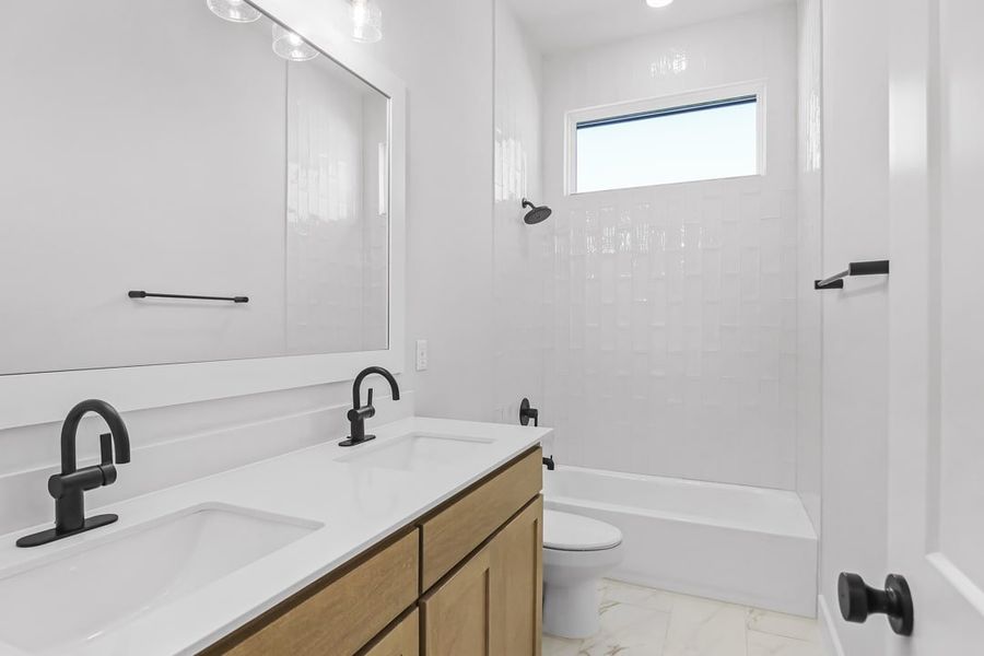 Furnished interior in a model home at Coppenger Place in Godley (Image 17).
