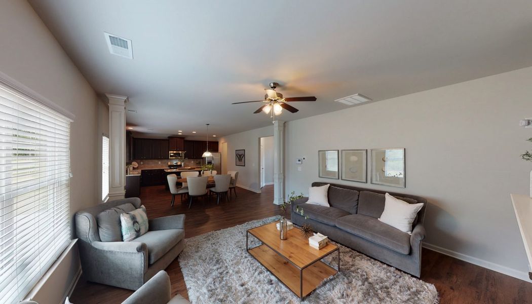 Furnished interior in a model home at North Village in Rydal (Image 16).