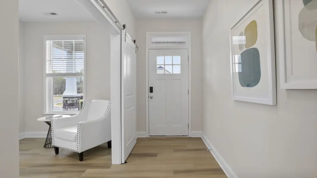 Furnished interior in a model home at Blue Ridge Trail in Fountain Inn (Image 5).