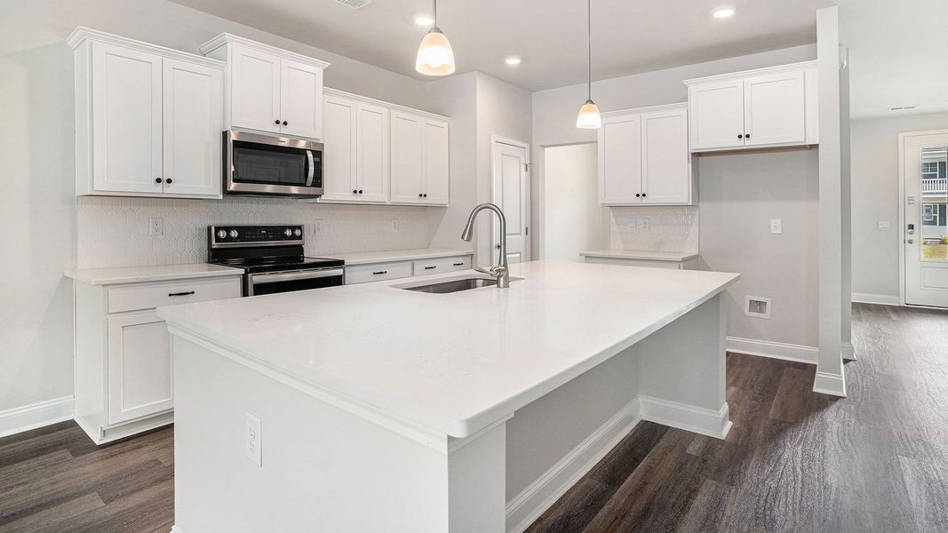 Furnished interior in a model home at Spring View Landing in Loris (Image 15).