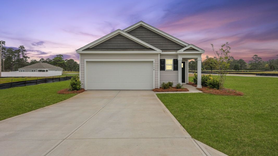 Front exterior of a home in the Huggins Hill community, located in Manning, SC (Image 1).